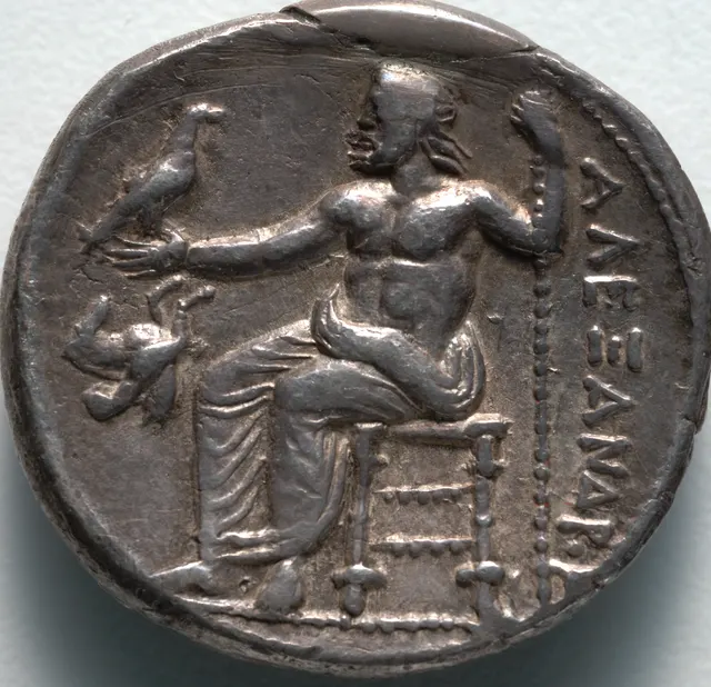 Reverse of the same tetradrachm: Zeus seated on a throne holding an eagle and a sceptre, with the name ΑΛΕΞΑΝΔΡΟΥ