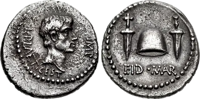 Silver EID MAR denarius of Brutus, 42 BC: his portrait, and a cap of liberty between two daggers (the gold version uses the same design)