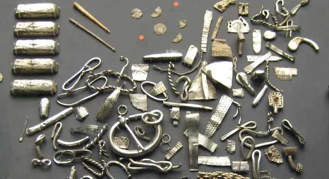 Part of the Cuerdale Hoard in the British Museum: Viking silver ingots, cut arm-rings, brooch fragments and coins