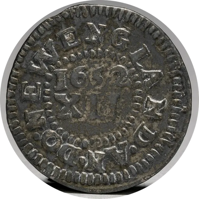 Reverse of a Pine Tree shilling with the date 1652 and the numeral XII inside the legend NEW ENGLAND AN DOM