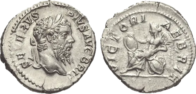 Denarius of Septimius Severus, AD 210 to 211, by then about half silver, with Victory seated on shields