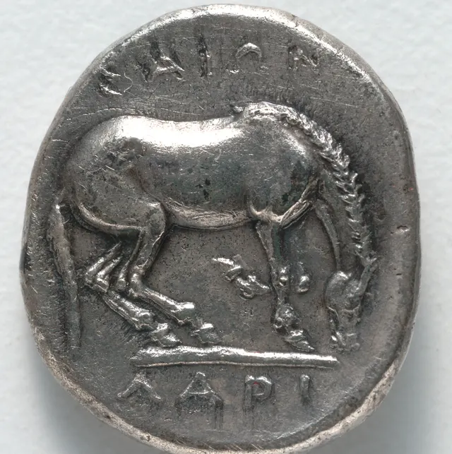 Reverse of the same drachm of Larissa: a grazing horse