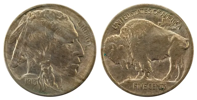 Obverse and reverse of a 1913 Buffalo nickel, a Native American profile and a bison standing on a mound