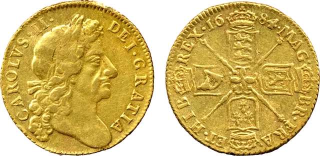 Gold guinea of Charles II dated 1684, machine-struck, with a laureate portrait on the front and four crowned shields on the back