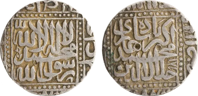 Akbar silver rupee struck at Agra in AH 981 (1573–74): the creed in a square on one side, Akbar's name and titles in a square on the other