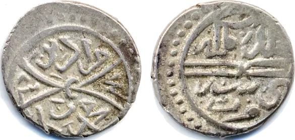 Small silver akçe of Murad II, struck at Serres in AH 837 (1433–34), covered in Arabic lettering with no pictures