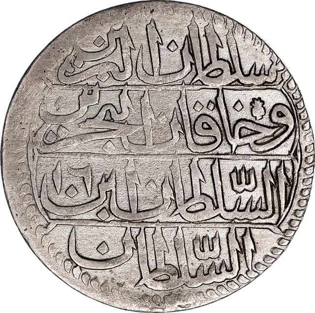 Reverse of the kuruş: the sultan's titles, "sultan of the two lands and khan of the two seas", in Arabic cartouches