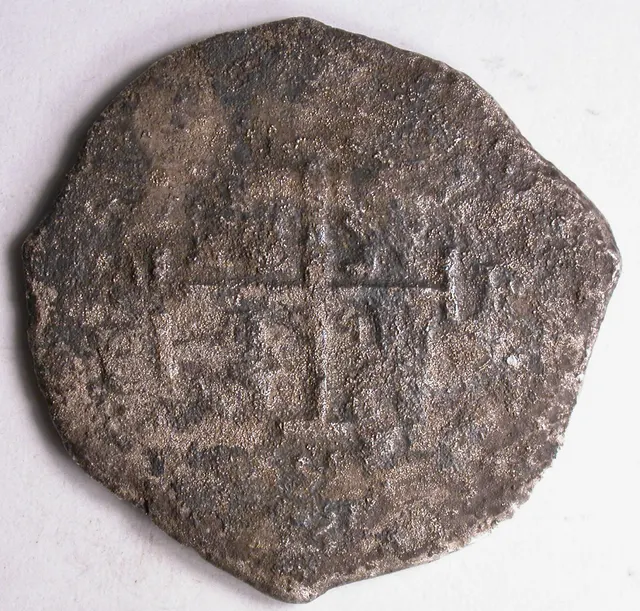 Irregular hand-struck silver 8 reales cob from the Potosí mint, Philip IV, dated 1658