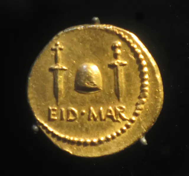 Gold aureus of Brutus showing a cap of liberty between two daggers above the letters EID MAR