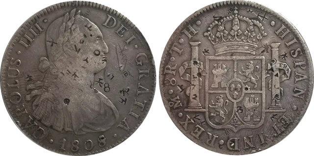 Both sides of a Spanish 8 reales of Charles IV dated 1808, with small Chinese merchants' chop marks punched across the portrait and the shield