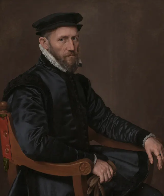 Portrait of Sir Thomas Gresham by Anthonis Mor: a bearded man in a black cap and coat, seated in a wooden chair