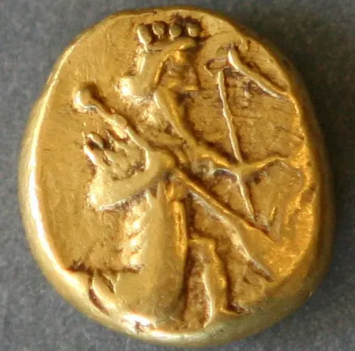 Gold daric of the Persian Empire, 5th century BC: the crowned king running to the right with a bow and spear