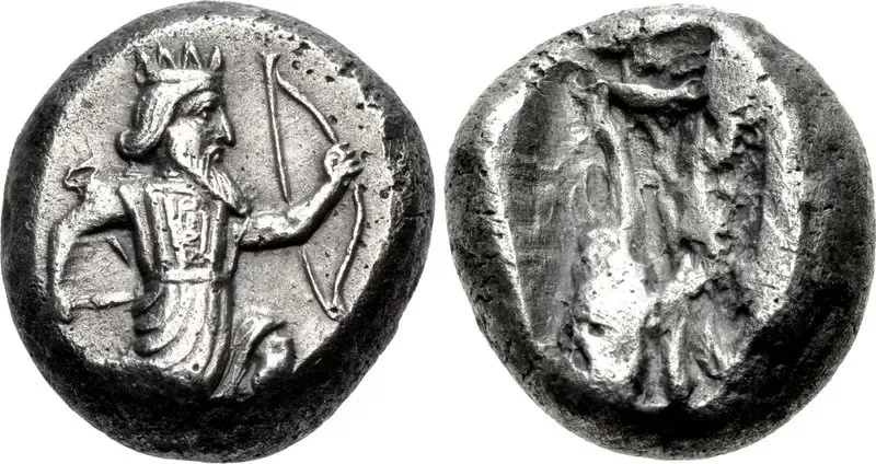 Silver siglos of the Persian Empire, about 420–375 BC, with the running archer king and a punch mark on the back