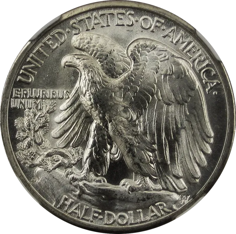 Back of the 1945-D half: an eagle on a rocky crag with a mountain pine, and the D mint mark at lower left