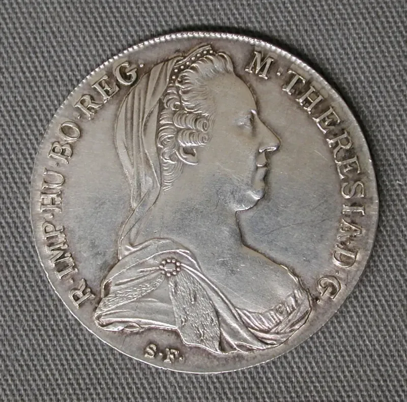 Maria Theresa thaler dated 1780, front: veiled bust of the widowed empress with her Latin titles