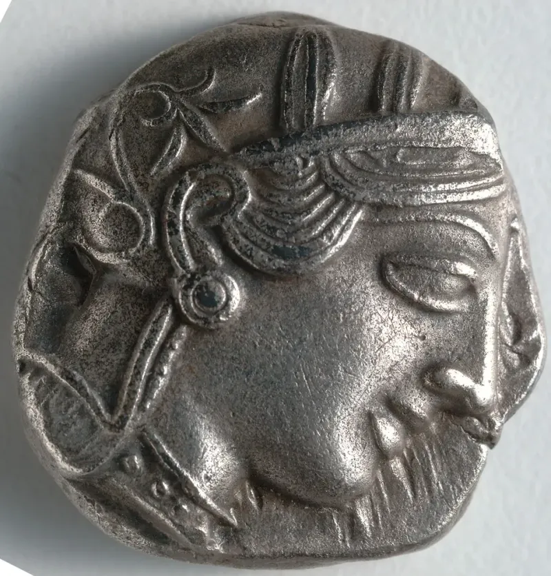 Silver tetradrachm of Athens, 5th century BC, showing the helmeted head of Athena in profile